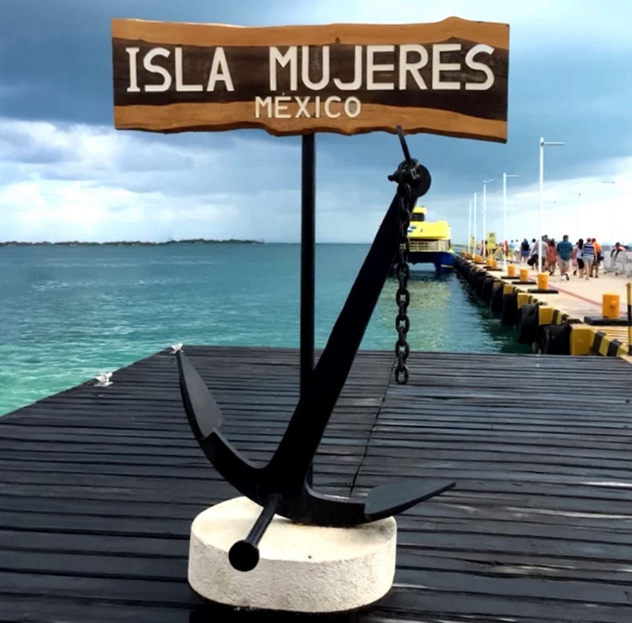Cancun airport to Isla Mujeres ferry trip from Puerto Juarez with turquoise Caribbean water